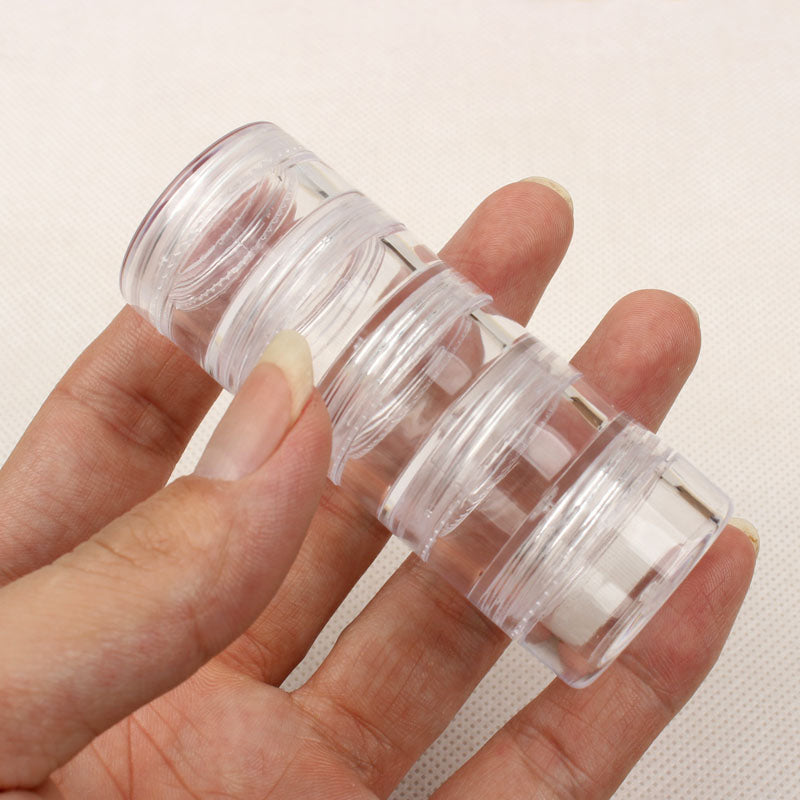 5 Connected Transparent Sealed Bottles